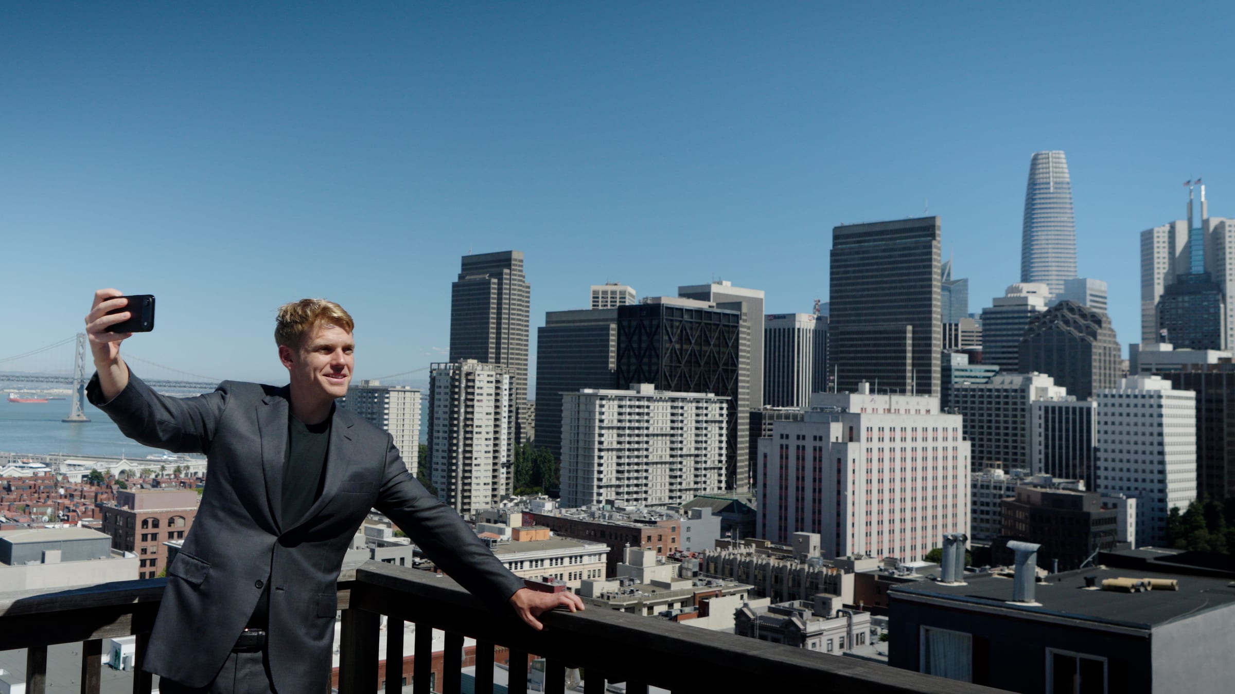 Jacob Warwick on a rooftop above downtown San Francisco